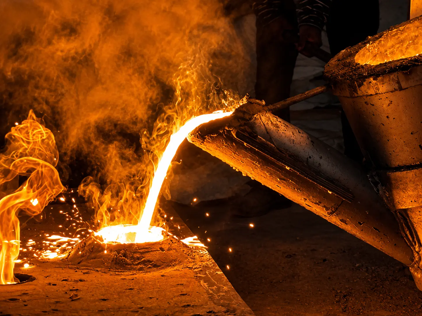 Molten metal being poured at AD Engineers